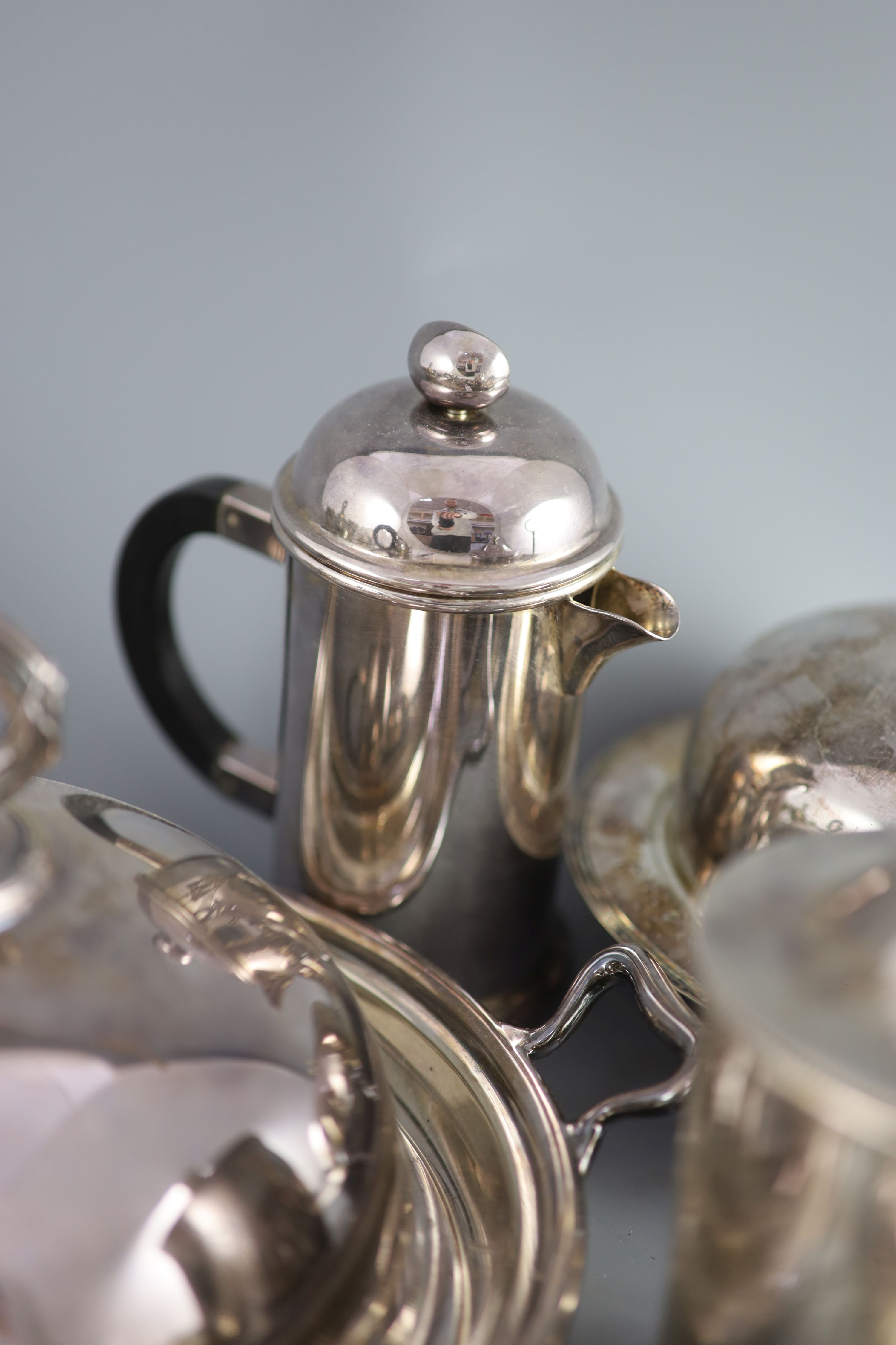 A silver plated egg cruet, a butter dish, a table salt and sundry other plated wares